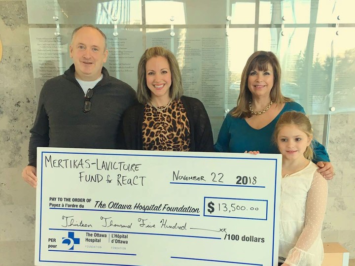  Gina presenting a cheque to Dr. Clemons in support of the REaCT program at The Ottawa Hospital.