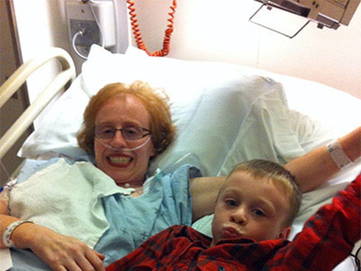  Karen Toop with her son, Ryan, following her accident in 2012.
