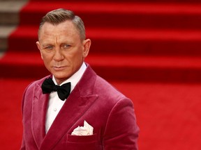 Daniel Craig poses as he arrives at the world premiere of the new James Bond film 'No Time To Die' at the Royal Albert Hall in London, Britain, on Sept. 28, 2021.