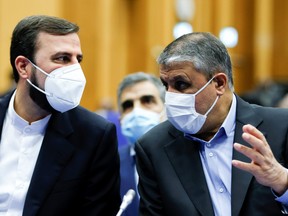 Iranian Atomic Energy Agency (IAEA) Chief Mohammad Eslamiand Iran's ambassador to the IAEA Kazem Gharibabadi attend the opening of the IAEA General Conference at their headquarters in Vienna, Austria, September 20, 2021.