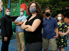 Mindy Sichel (centre) and her husband Kevin Neden (centre right), along with Joël Beddows (far left) and his husband Lawrence Aronovitch and another parent and family doctor, Shoshanah Deaton (far right) are just some of the parents of kids at Francojeunesse School in Sandy Hill that plan to keep their kids home on Election Day.