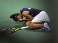 TOPSHOT - Canada's Leylah Fernandez reacts after winning her 2021 US Open Tennis tournament women's semifinal match against Belarus's Aryna Sabalenka at the USTA Billie Jean King National Tennis Center in New York, on September 9, 2021.