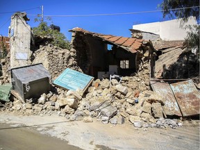 A photograph shows a demolished house following an earthquake, in Arkalochori village on the Crete island, on September 27, 2021.