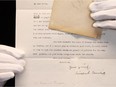 Matthew Haley, Head of Books and Manuscripts, holds a typed letter written by former British Prime Minister Winston Churchill, sent to Sir Frederick Ponsonby in 1929, soon to be auctioned at Bonhams in London, Britain, September 7, 2021.