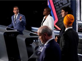 From left: Bloc Québécois Leader Yves-François Blanchet, Green Party Leader Annamie Paul, Liberal Leader Justin Trudeau, NDP Leader Jagmeet Singh and Conservative Leader Erin O'Toole take part in the English-language debate in Gatineau on Sept. 9, 2021.