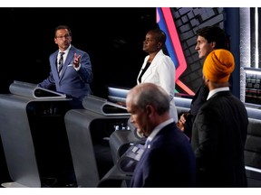Left to right: Bloc Québécois Leader Yves-François Blanchet, Green Party Leader Annamie Paul, Liberal Leader Justin Trudeau, NDP Leader Jagmeet Singh, and Conservative Leader Erin O'Toole take part in the English-language Leaders debate in Gatineau on Sept. 9.