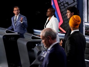 Left to right: Bloc Quebecois Leader Yves-Francois Blanchet, Green Party Leader Annamie Paul, Liberal Leader Justin Trudeau, NDP Leader Jagmeet Singh, and Conservative Leader Erin O'Toole take part in the federal election English-language Leaders debate in Gatineau, Canada, Sept. 9, 2021.