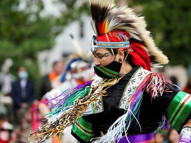 Nanook Gordon, from Inuvik, dances while wearing grass dance regalia during Canada's first National Day for Truth and Reconciliation, honouring the lost children and survivors of Indigenous residential schools, their families and communities, in Toronto, Ontario.