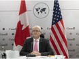 Foreign Affairs Minister Marc Garneau, shown here prior to a virtual meeting with the U.S. Secretary of State, addressed the UN General Assembly this week on Canada's behalf. He didn't have much to boast about.