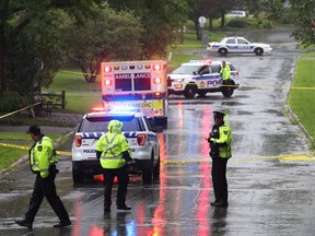 Police investigate a scene on Tavistock Road after a man shows up at the Queensway-Carleton Hospital with a gunshot wound on July 24, 2017.