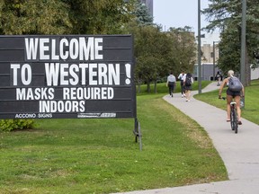 Files: Students travel through the campus at Western University in London, Ont. on Tuesday September 22, 2020.