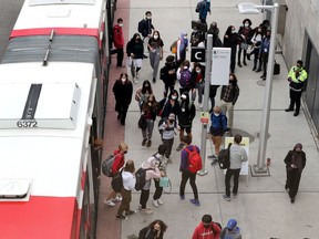 OC Transpo R1 busses pick up riders at Blair Station in Ottawa's east end Monday.