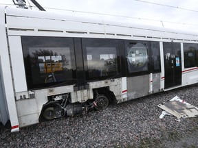 A photo of the damaged LRT car after a summer 2021 derailment near Tremblay Station.