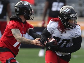 Files: Ottawa Redblacks training camp at TD Place in Ottawa Monday July 12, 2021. #20 Timothy Flanders running with the ball .