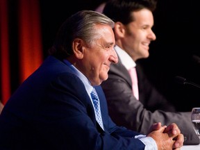Lino Saputo Sr., front, of the Montreal dairy giant Saputo Inc., and Lino A. Saputo Jr., president of and chief executive officer of the company, are seen at the annual Saputo meeting in Laval, in 2009.