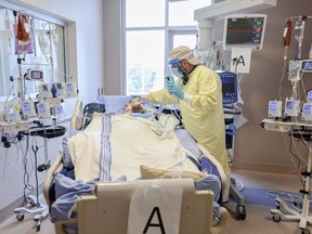 File photo/ A patient is in the Intensive Care Unit at the Peter Lougheed Centre in Alberta.