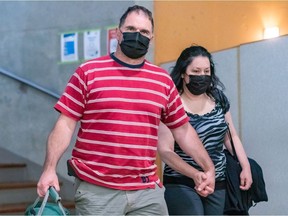 Guy Dion and Marie-Josée Viau are charged with the 2016 murders of brothers Vincenzo and Giuseppe Falduto. The couple entered the Gouin courthouse in Montreal on Thursday May 27, 2021.