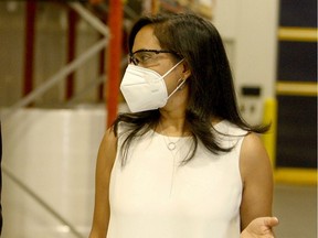 Federal Procurement Minister Anita Anand wears an N95 mask during a recent public appearance.
