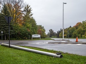 The scene of an overnight rollover that involved an Ottawa Police Service vehicle at the corner of Aviation Parkway at La Cite Private, Sunday October 10, 2021.