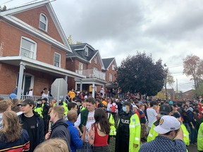 An estimated 8,000 partygoers in the University District gathered on Aberdeen Street on Saturday afternoon, despite pleas from the City of Kingston and Kingston Police to limit gatherings during Homecoming this year.