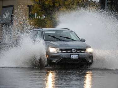 OTTAWA -- October 16, 2021 -- Ottawa was hit with heavy rainfall Saturday, October 16, 2021, that result in flooding on many area streets. Some vehicles chose alternate routes, but some ventured through a large, very deep puddle on Industrial Ave near the Train Yards Saturday morning. 

ASHLEY FRASER, POSTMEDIA