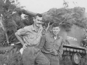 Sheridan "Pat" Patterson (left) stands alongside an unnamed tank crewmate during the Korean War.