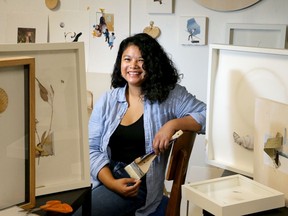 Local artist Kristina Corre in her studio at the Enriched Bread Artist Studios Thursday.