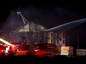 Ottawa Fire Services crews battle a blaze at an unoccupied construction site near the Canadian Tire Centre.