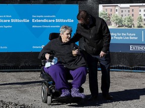 West End Villa resident Ann Cioppa, 79, returns to the honoured guests area after thanking everyone involved at the groundbreaking ceremony for Extendicare Stittsville on Friday.