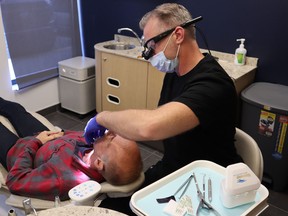 The dentists at Capital Dentistry have several ways to help patients overcome any anxiety and make treatments painless and relaxing. SUPPLIED PHOTOS