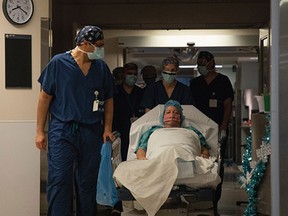 Michele Juma being wheeled into surgery at The Ottawa Hospital to remove her meningioma tumour.  SUPPLIED PHOTOS