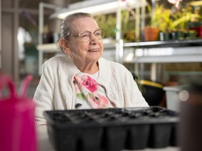 Long-term care resident Theresa Lavigeur participates in on-site horticultural therapy, part of Perley Health’s Therapeutic Recreation and Creative Arts program. SUPPLIED PHOTO