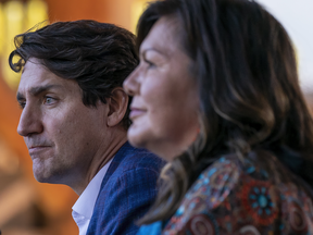Justin Trudeau listens to Chief Rosanne Casimir during a Monday visit to Tk’emlúps te Secwépemc.