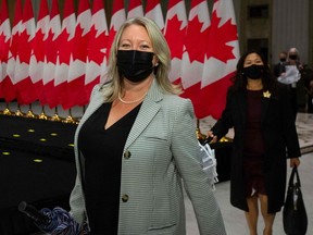President of the Treasury Board Mona Fortier arrives for a media conference in Ottawa on Tuesday.