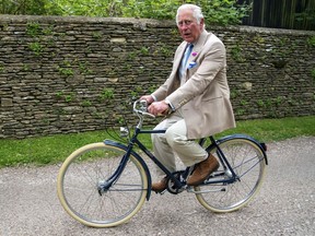 File photo/ Britain's Prince Charles rides a bike.
