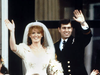 Prince Andrew, the Duke of York and his wife Sarah Ferguson, the Duchess of York on their wedding day. They remain close despite divorcing in 1996.