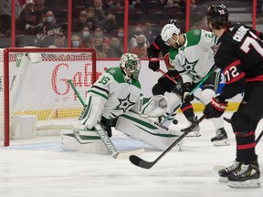 Dallas Stars goalie Anton Khudobin (35) makes a save on a shot from  Ottawa Senators defenceman Thomas Chabot (72) in the first period at the Canadian Tire Centre on Sunday.