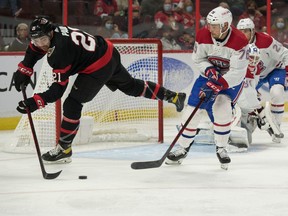 Ottawa Senators left wing Nick Paul (21) chases the puck following a shot on goal in the second period against the Montreal Canadiens at the Canadian Tire Centre on Friday.