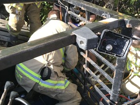 Firefighters rescued a man trapped under a forklift on Leitrim Rd.