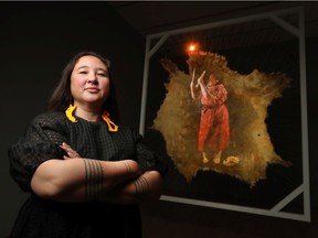 The 2021 Sobey Art Award exhibition media preview at the National Gallery of Canada in Ottawa. Artist Laakkuluk Williamson Bathory in front of her art Wednesday.