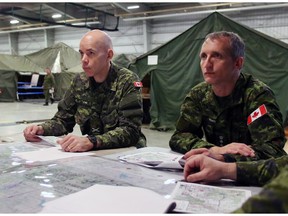Acting Chief of the Defence Staff Gen. Wayne Eyre, left, pictured in this file photo from 2015 alongside Lieutenant General Trevor Cadieu.