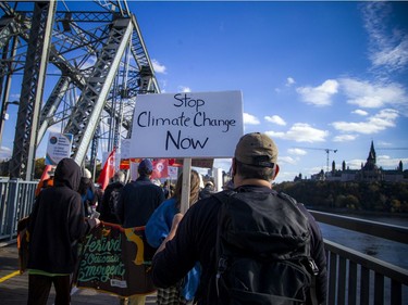 The group marched from Gatineau to Ottawa across the Alexandra Bridge.