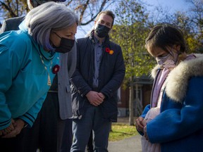 Gov. Gen. Mary May Simon speaks with Napachie Pootoogook, 9, at Sunday's official naming of Annie Pootoogook Park in Sandy Hill. Napachie is the daugther of Annie, who died in 2016.