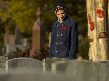 Charlie Watson walks amongst the military graves at Beechwood Cemetery.