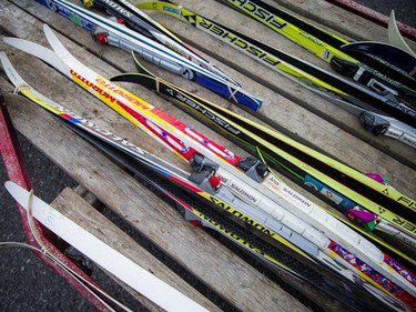 A group of volunteers, Nepean High School students and parents gathered in the Remic Rapids Park parking lot to clean up and wax donated cross-country skis that will be for the Kichi Sibi Winter Trail's Skis for Schools program, Sunday, November 14, 2021.