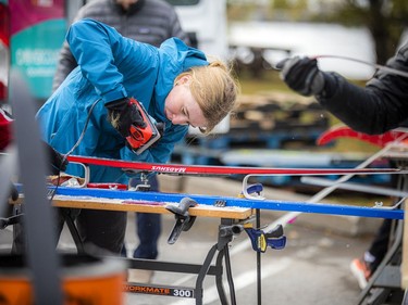 Margot West worked away at scraping the wax off the skis, making sure they are in the best condition they can be in for the upcoming winter season.