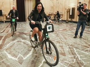 Montreal Mayor Valerie Plante takes a Bixi for a spin around the Hall of Honour at City Hall in Montreal in 2019.