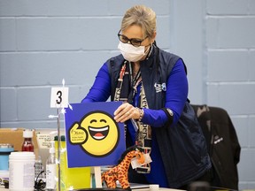 Ottawa Public Health nurse Marilyn Gagnon at her child-friendly immunization station at the Eva James Memorial Centre.