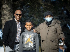 Russom Woldemichael, CEO and founder of Barcon Getta Inc., left, with nine-year-old nephew Nathanael Woldenichael and father Haile Kidane.