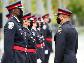 Ottawa Police Chief Peter Sloly inspects new recruits during the formal badge ceremony on Sept. 29, 2021. Ottawa has significantly fewer police officers than other major cities, relative to the size of our population.
